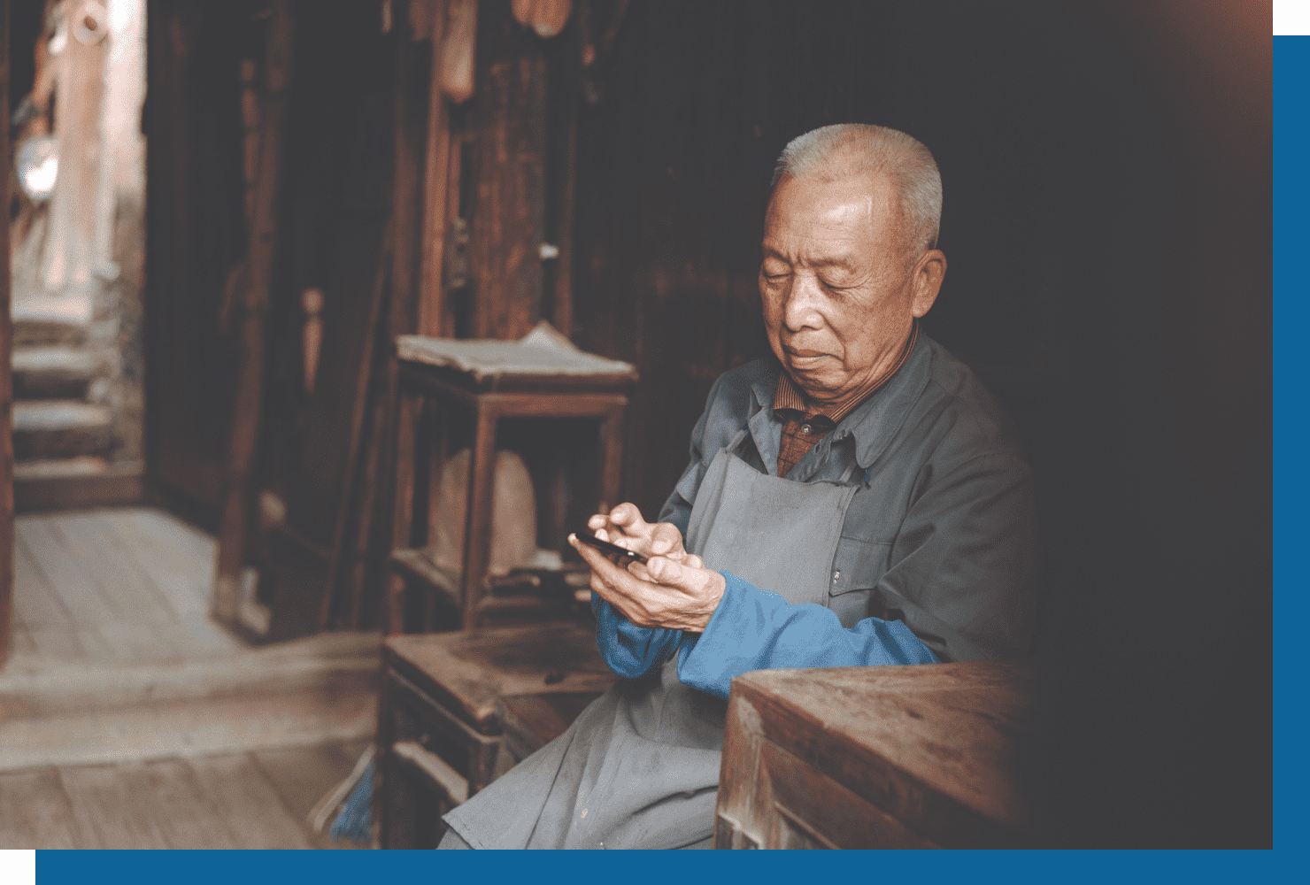old man using phone
